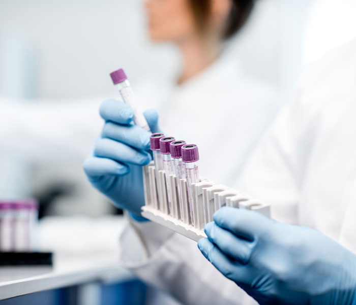 Lab worker selecting samples